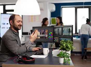 Multimedia Creator Artist On Videocall With Client.