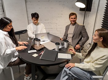 Graphic Designer Working In Office With Laptop.